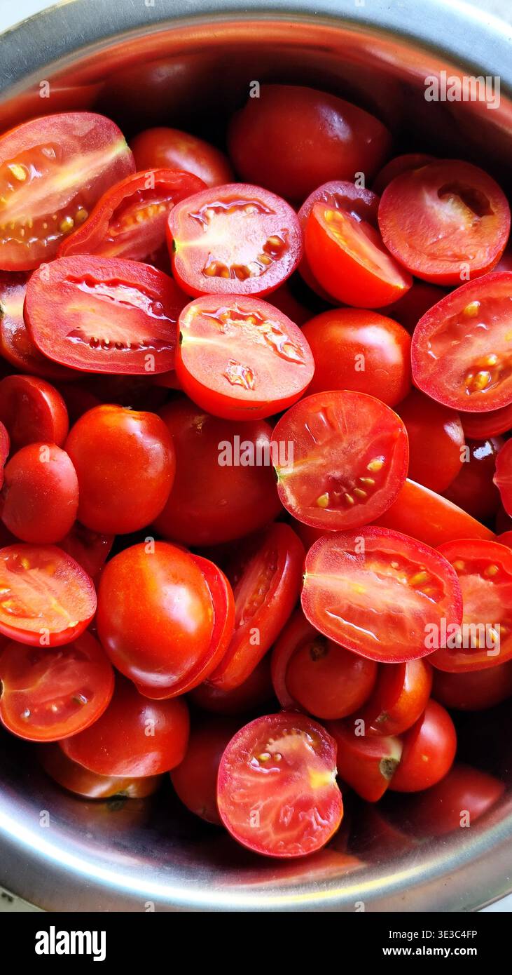 Pomodori ciliegini rossi. Sfondo Screensaver Foto Stock