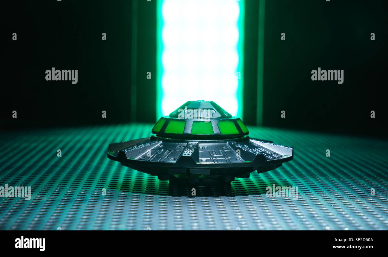 Concetto di UFO in un gancio. Foto Stock