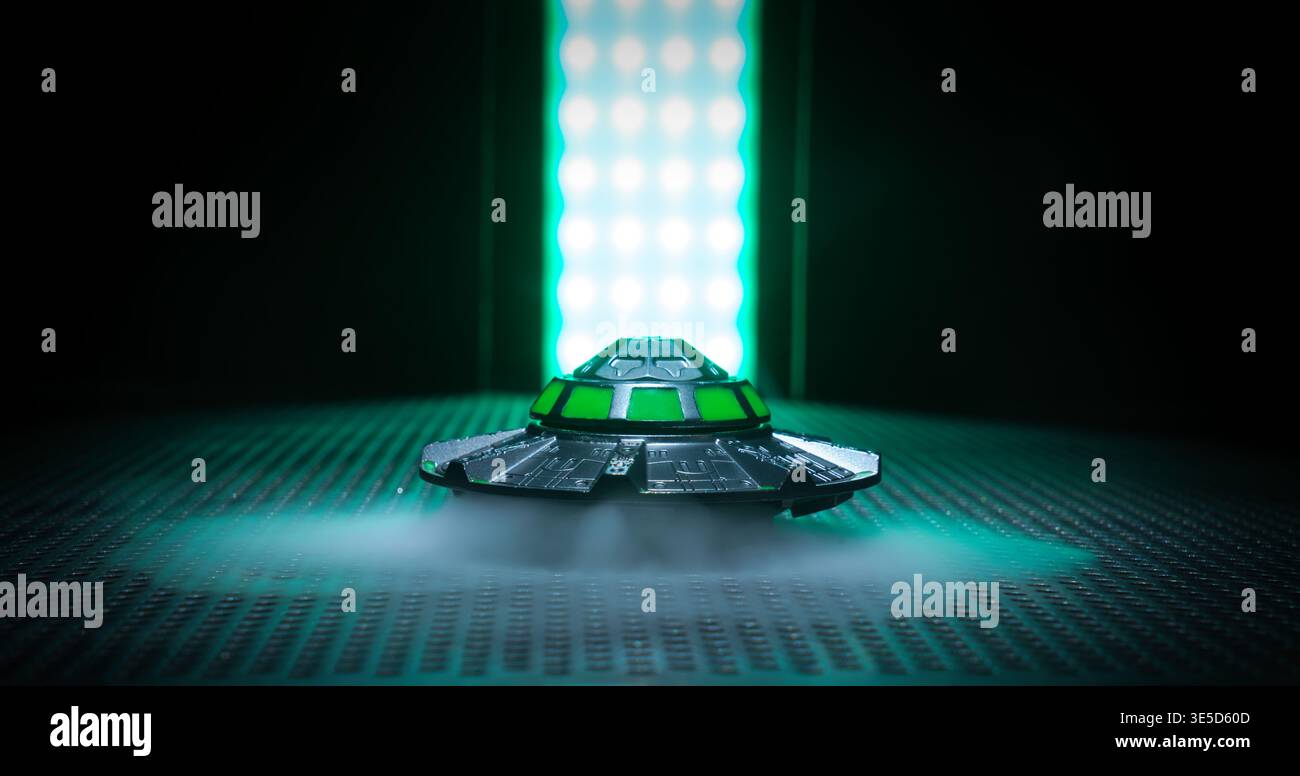 Concetto di UFO in un gancio. Foto Stock