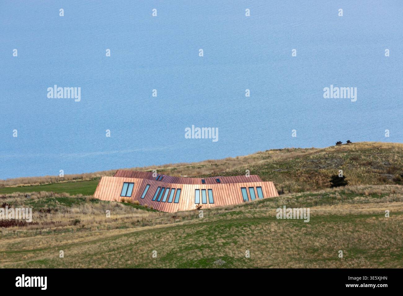 The Mt Isthmus Villa, una sistemazione di lusso situata sul lago Hāwea a Otago, nuova Zelanda Foto Stock