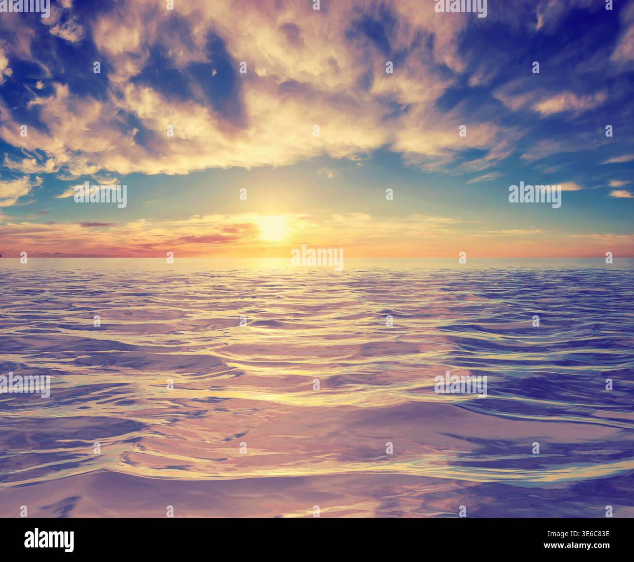 Una sfumatura di arancione, blu e viola rende omaggio al cielo nuvoloso, che si riflette magnificamente sulle acque cristalline al crepuscolo Foto Stock
