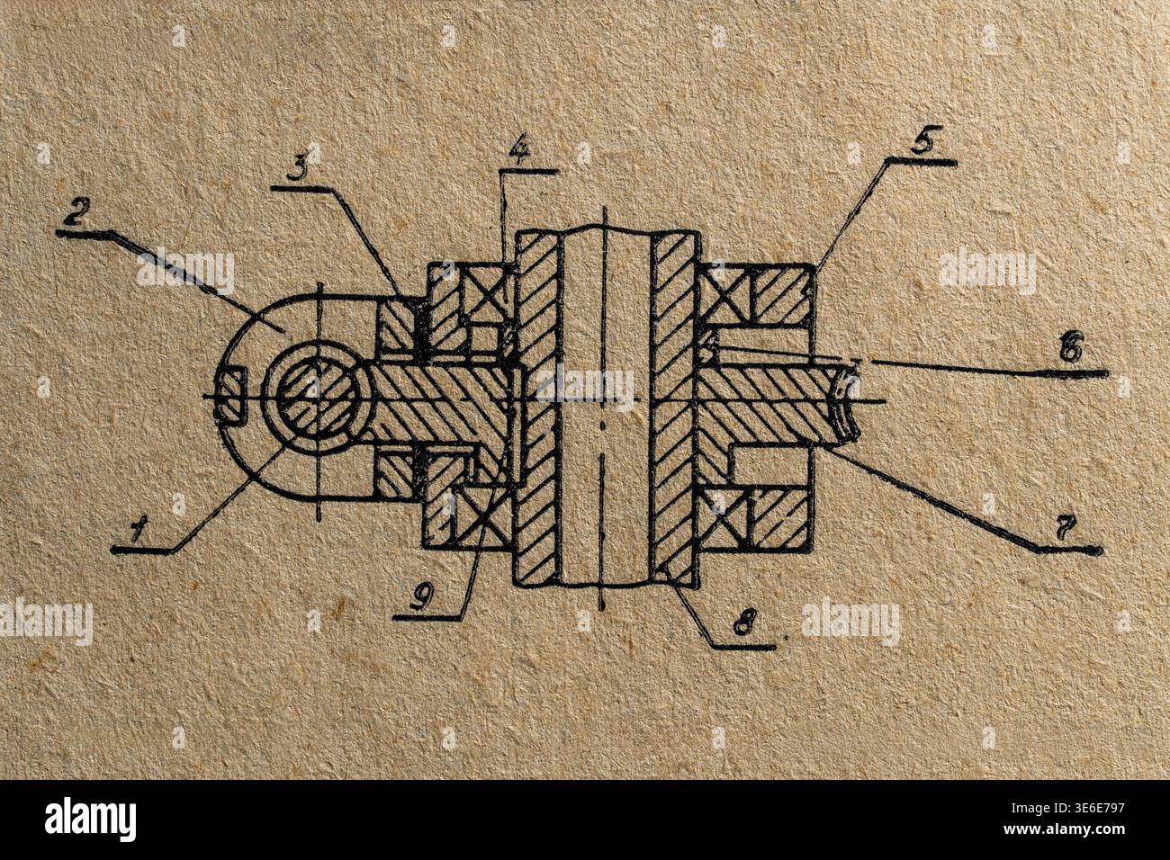 Illustrazione vintage di un giunto meccanico e di un gruppo cuscinetto su carta ruvida. Ideale per i professionisti della progettazione, della storia e del design industriale Foto Stock