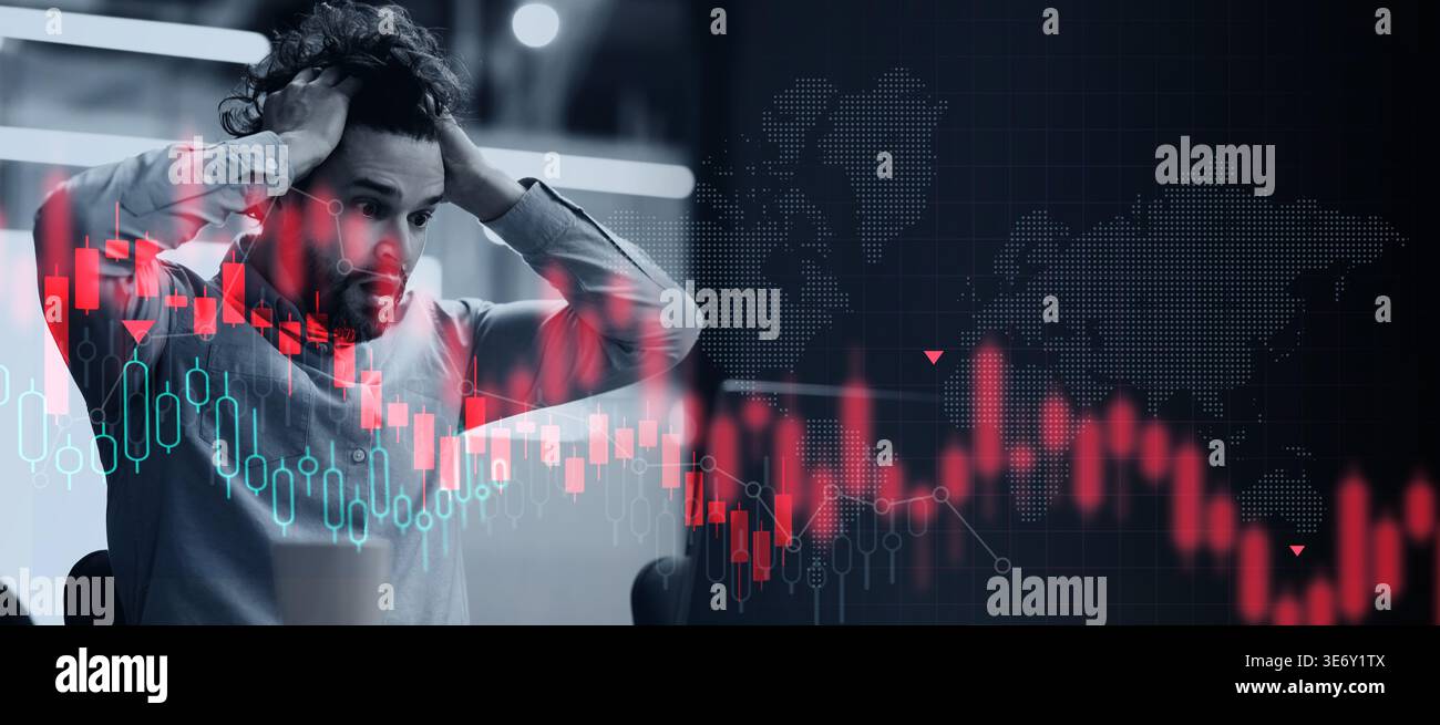 Man mostra stress durante l'analisi dei dati del mercato azionario in un ambiente d'ufficio Foto Stock
