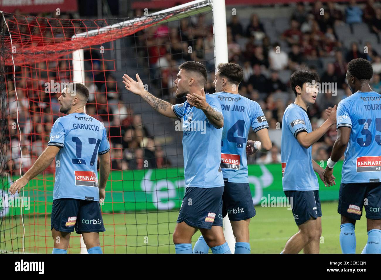 Sydney, Australia. 11 aprile 2026. Sydney FC Alex Popovic (41) fissa i Wanderers RBB dopo che gli Sky Blues aprono il punteggio nel Sydney Derby. Foto Stock