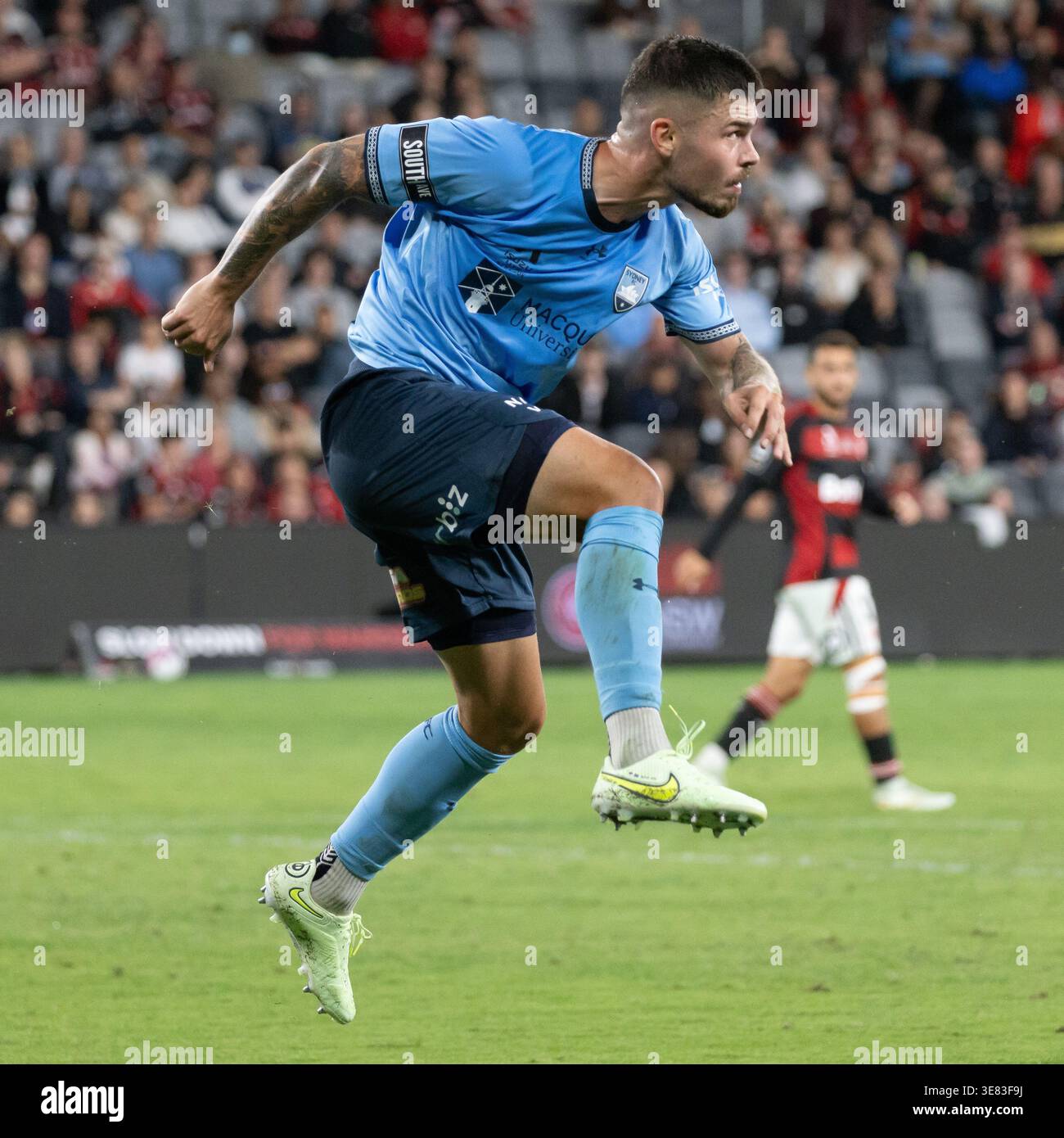Sydney, Australia. 11 aprile 2026. Alex Popovic (42) del Sydney FC elimina il pericolo durante l'A-League Men Sydney Derby contro Western Sydney Wanderers. Foto Stock