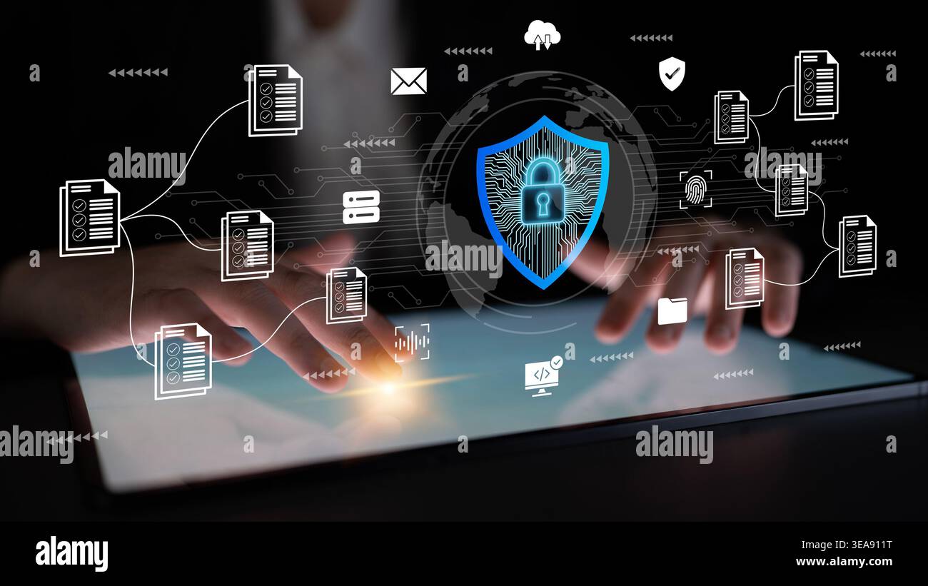 Un individuo concentrato interagisce con un tablet, circondato da icone simboliche che rappresentano la sicurezza informatica e la protezione dei dati in uno spazio di lavoro contemporaneo Foto Stock