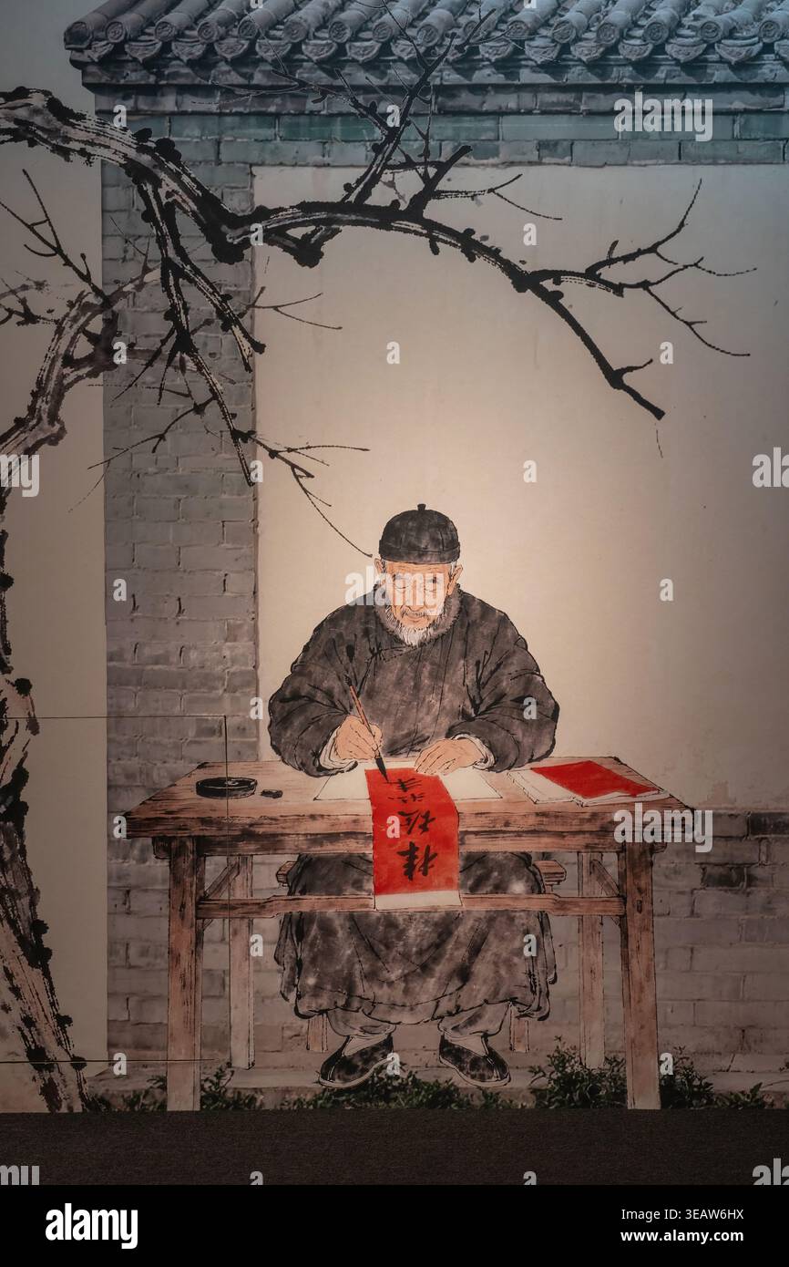 Scena di anziani che scrivono distici Foto Stock