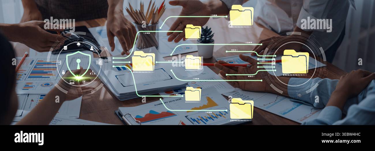 Workspace digitale collaborativo con il concetto di organizzazione dei file, gestione dei dati e sicurezza informatica nell'atmosfera delle riunioni aziendali Fluxor. Foto Stock