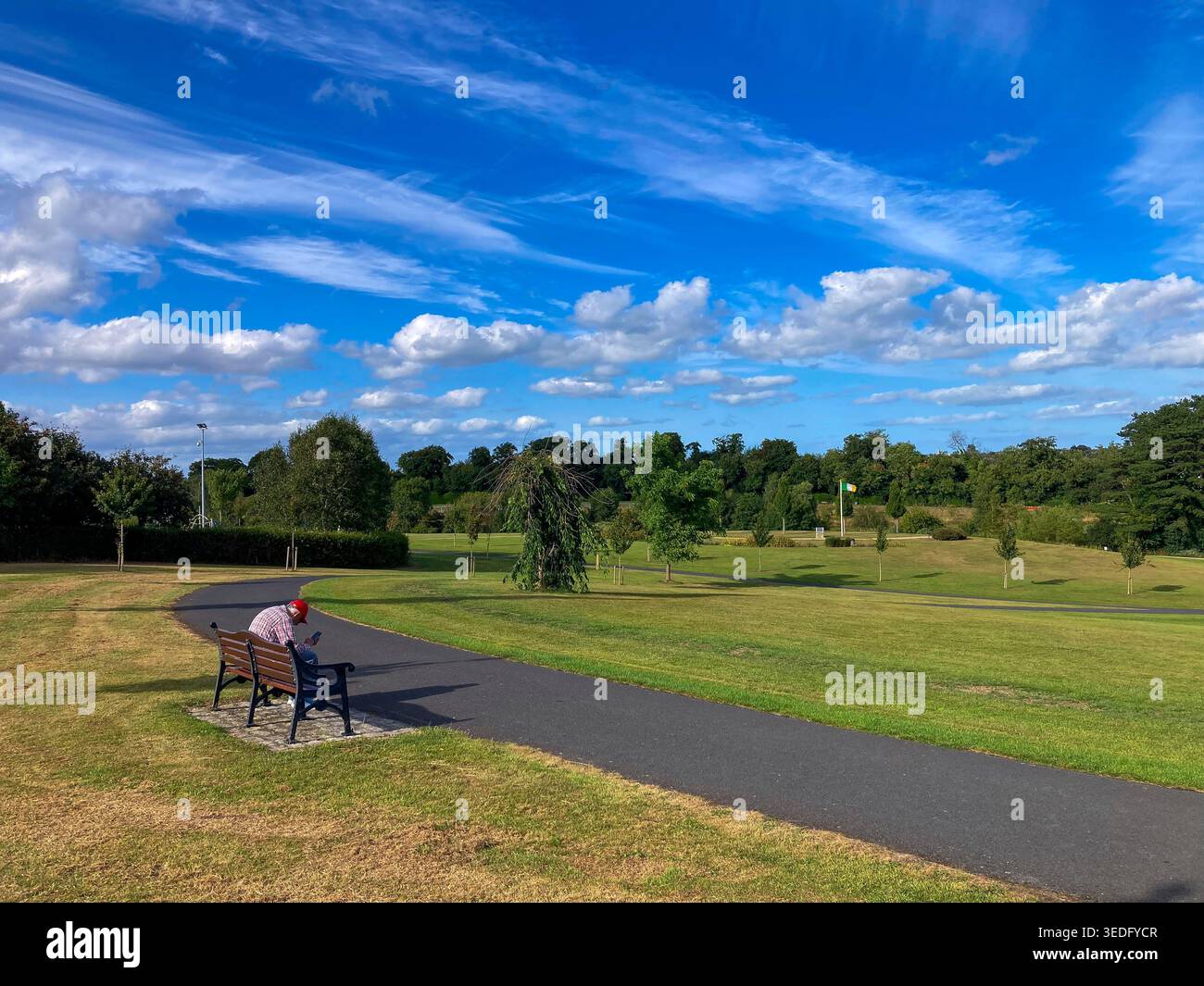 da solo in un parco pubblico Foto Stock