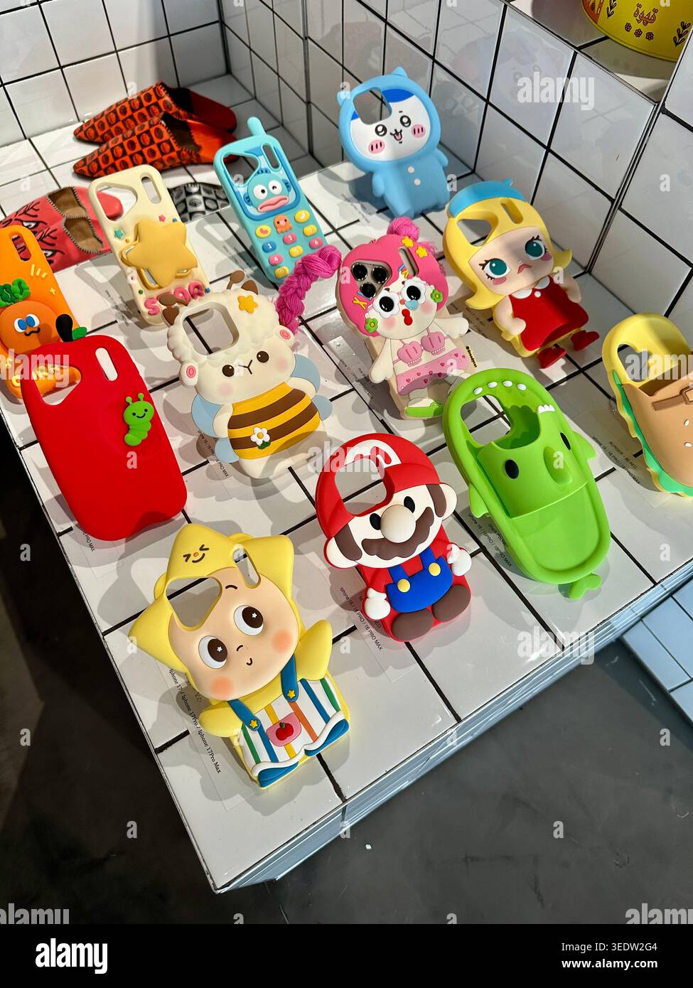 Custodie per telefoni cartoni animati Foto Stock