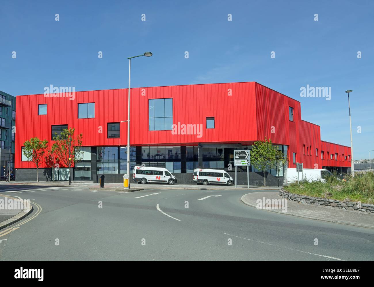 Il caratteristico edificio rosso ora sede della Millbay Academy Foto Stock