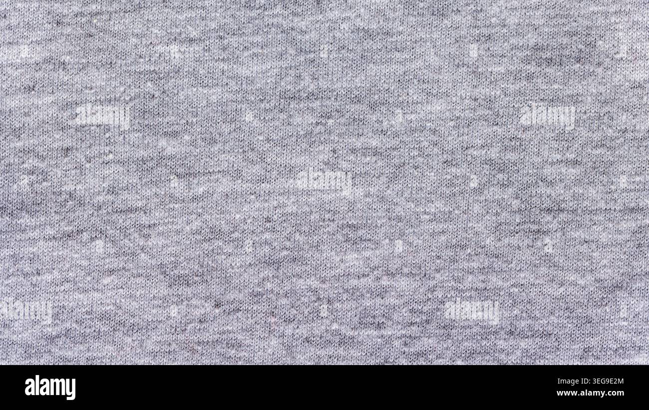 Tessuto in Jersey di cotone lavorato a maglia grigio Erica per uno sfondo morbido Foto Stock