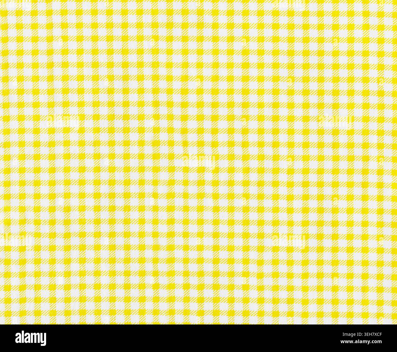 Primo piano di tessuto Vichy giallo e bianco Foto Stock