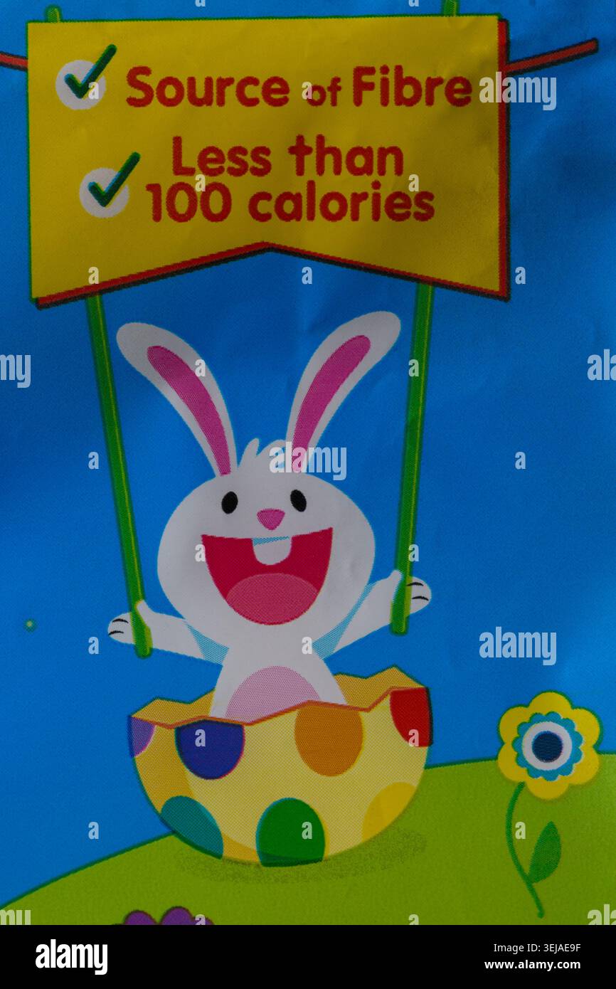 Fonte di fibre inferiore a 100 calorie - dettaglio sulla confezione di cioccolato Soreen deliziosamente elasticizzato e 5 mini pani arancioni Foto Stock