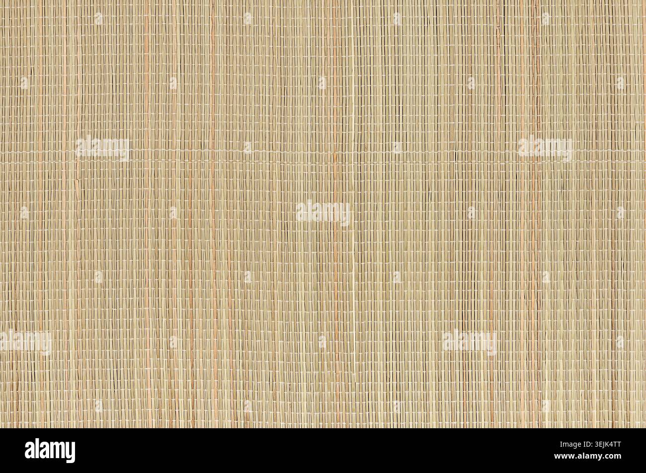 Tappeto naturale beige di vimini secco come consistenza, sfondo. Foto Stock