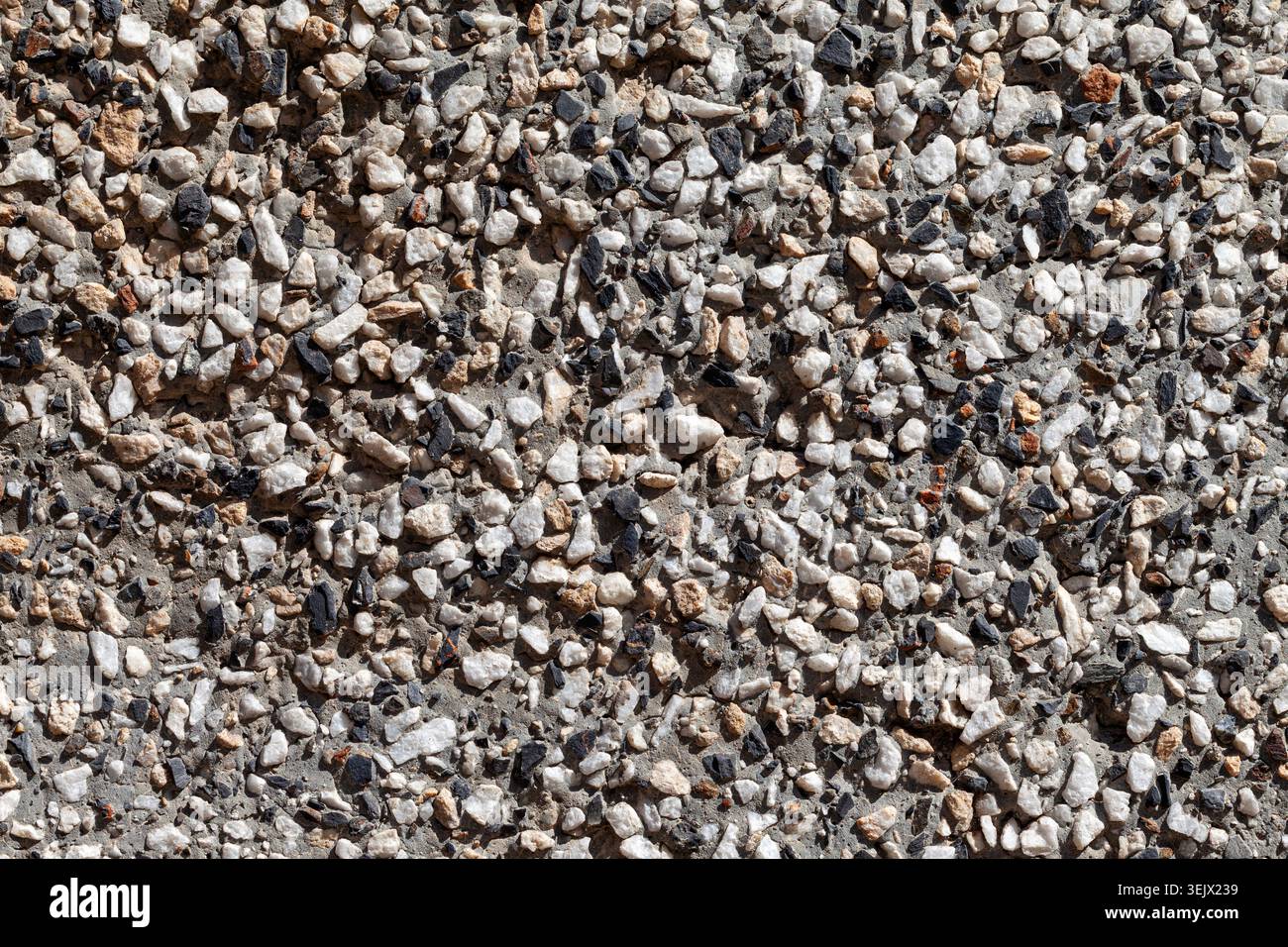 Mosaico Natural Stone Plaster con sfondo bianco e nero e marrone Foto Stock
