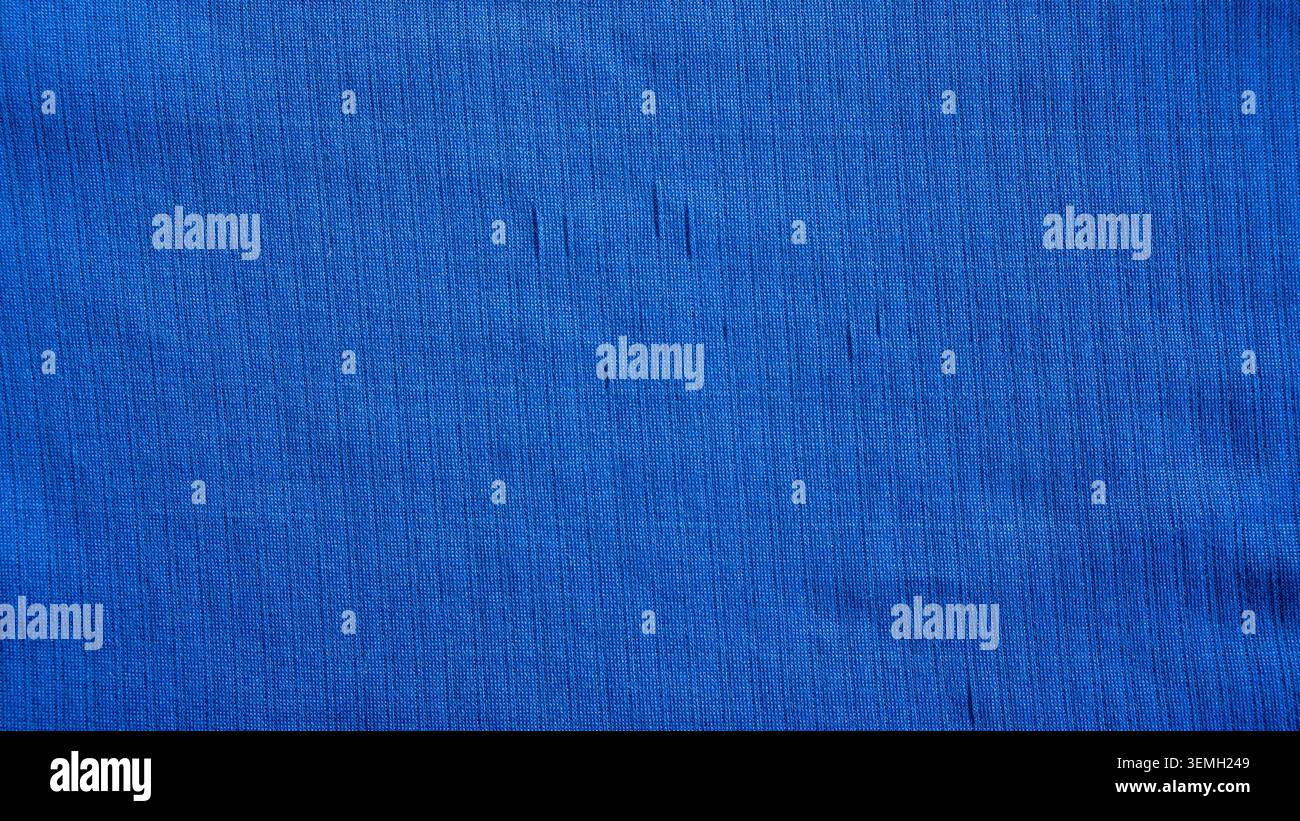 Texture piatta in maglia blu a coste con linee verticali sottili Foto Stock