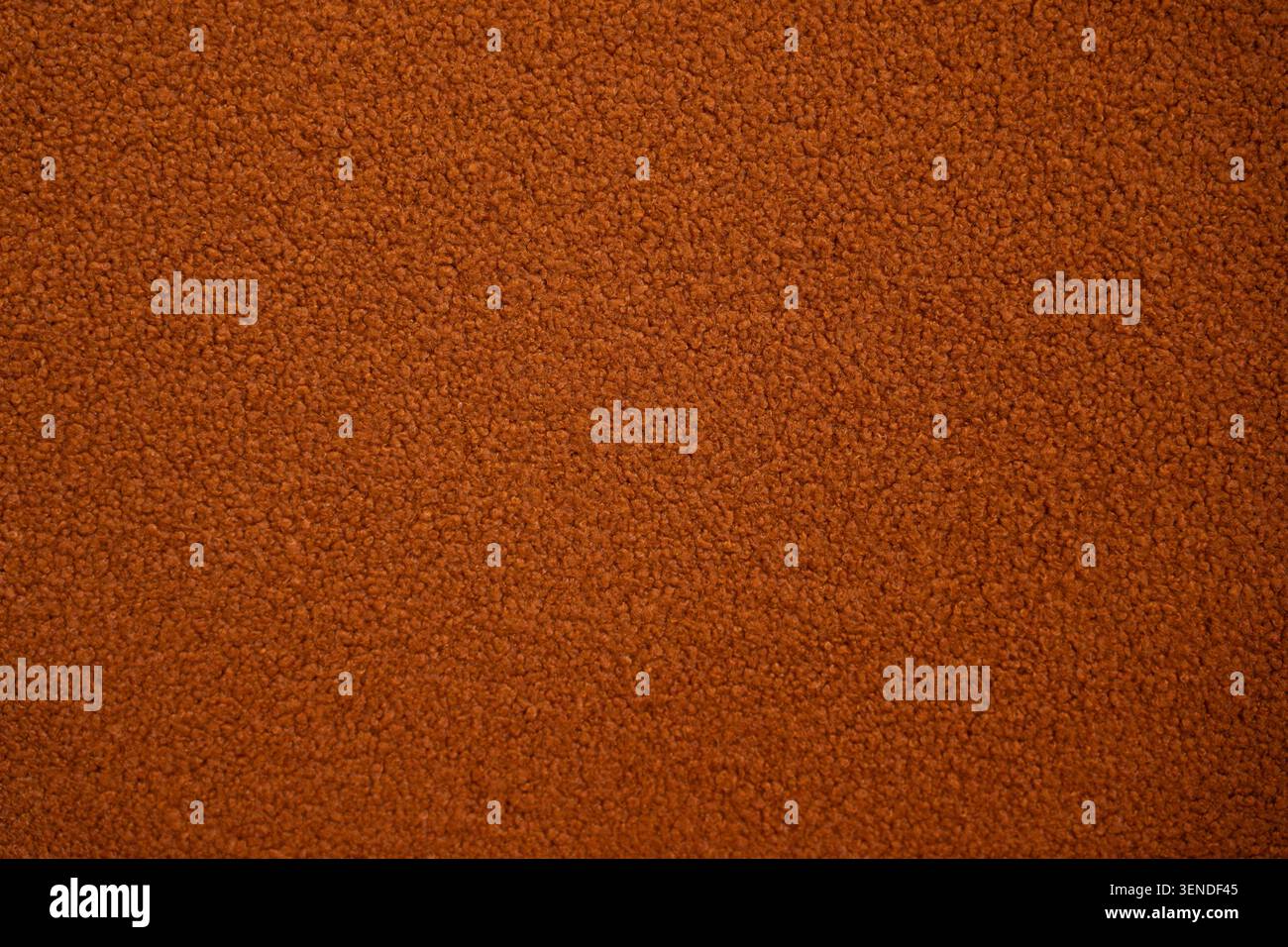 Tessuto boucle in terracotta con vista macro, arredamento contemporaneo, sfondo tappezzeria con caldo colore terroso Foto Stock