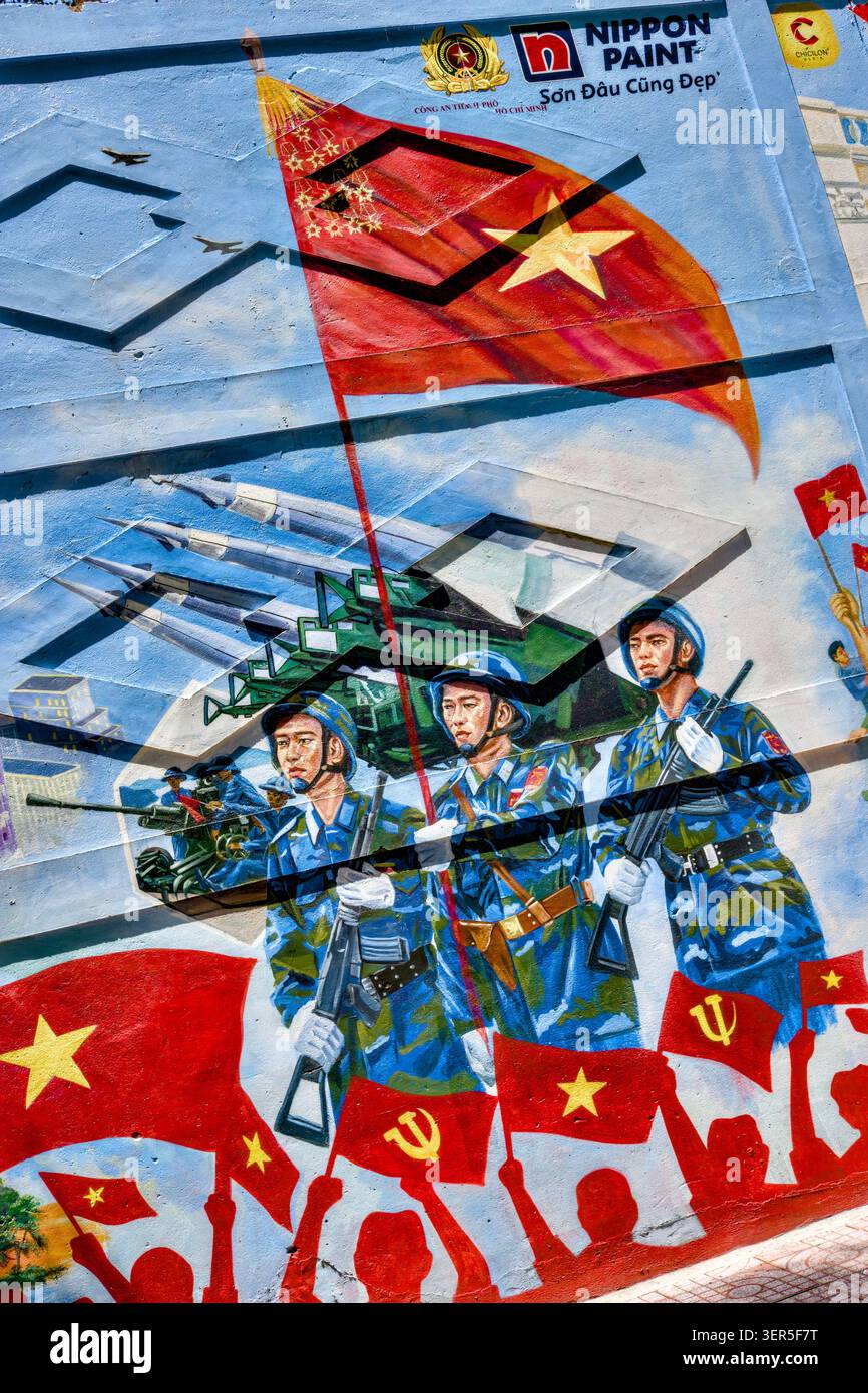 Wall Painting celebra il 50° anniversario della riunificazione del Vietnam nel 1975, ho chi Minh City, Vietnam Foto Stock
