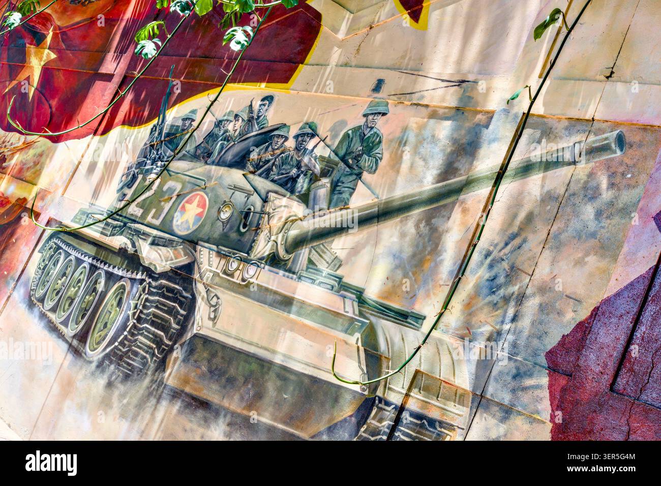 Wall Painting celebra il 50° anniversario della riunificazione del Vietnam nel 1975, ho chi Minh City, Vietnam Foto Stock