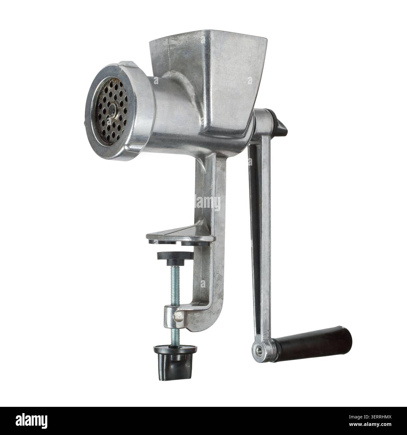 Macinacaffè manuale in metallo su sfondo bianco. Macinacaffè classico. Un vecchio macinacaffè. Foto Stock