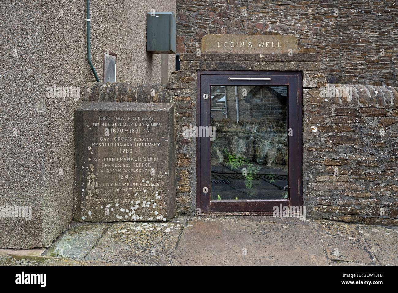 Il pozzo di login a Stromness forniva acqua alle navi della Baia di Hudson, alle navi del capitano Cook e alle navi di Sir John Franklin Terror ed Erebus. Foto Stock
