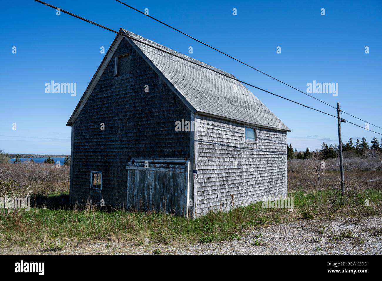 Vecchio capannone in legno sulla Lighthouse Route nel Lower East Pubnico, nuova Scozia, Canada Foto Stock