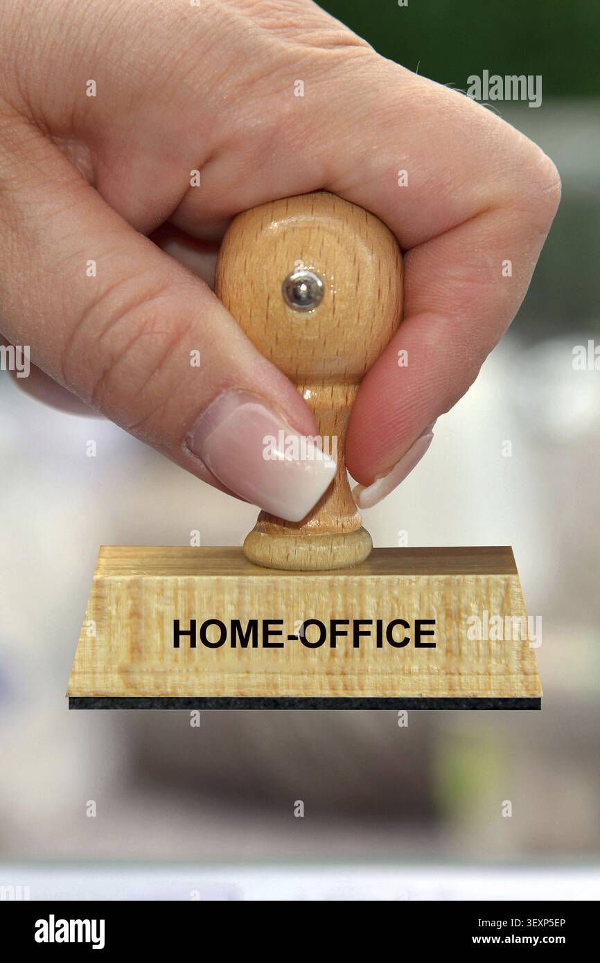 Mano con timbro, mano della donna, iscrizione: Ufficio domestico, ufficio domestico, casa, lavoro, studio, bassa Sassonia, Repubblica Federale tedesca Foto Stock