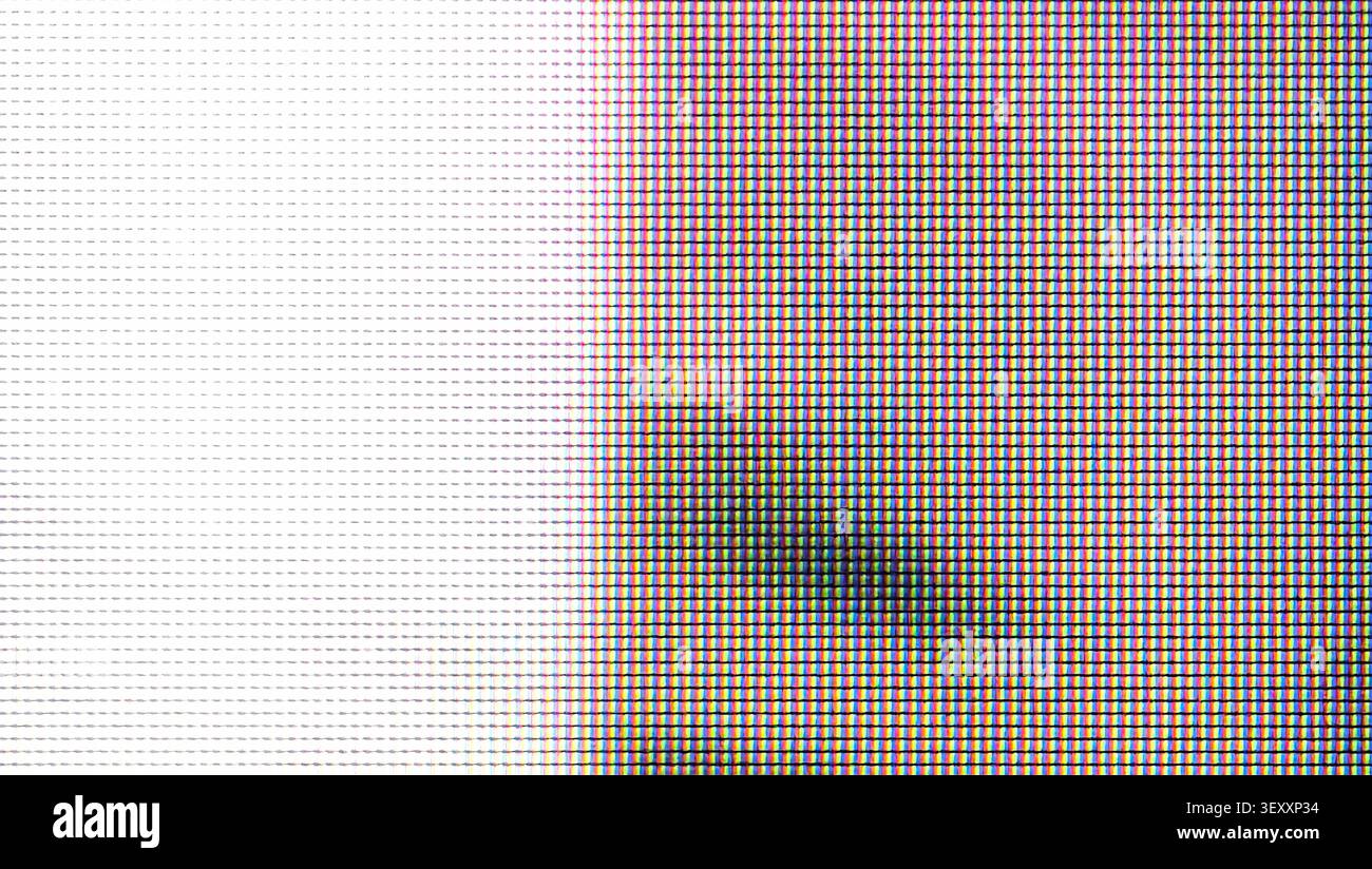 Vista macro ravvicinata dei pixel RGB colorati che formano uno schermo digitale Foto Stock