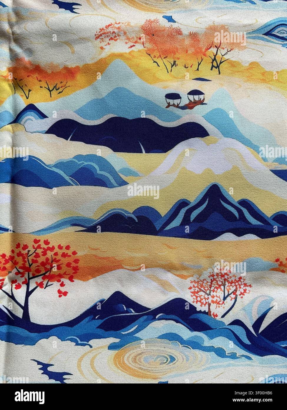 Stampa su tessuto giapponese colorata con un paesaggio stilizzato con montagne blu, alberi rossi autunnali Foto Stock