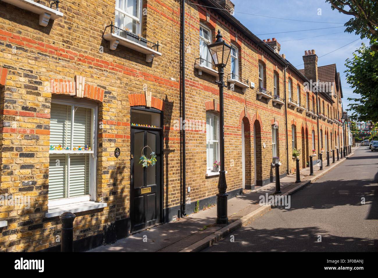 Chancery Lane, una terrazza di case in mattoni attraente, Beckenham, Bromley, Londra, Regno Unito Foto Stock