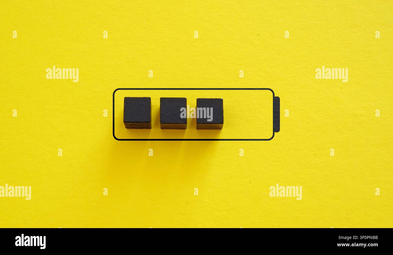 Batteria scarica come metafora della fatica umana. Foto Stock