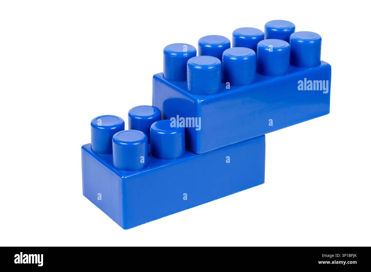 Due blocchi collegati di un set di costruzione per bambini. Dettagli blu del costruttore Foto Stock