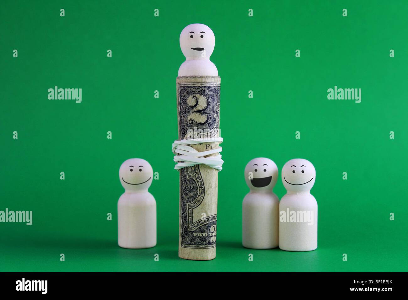Leader legato a una banconota da due dollari Foto Stock