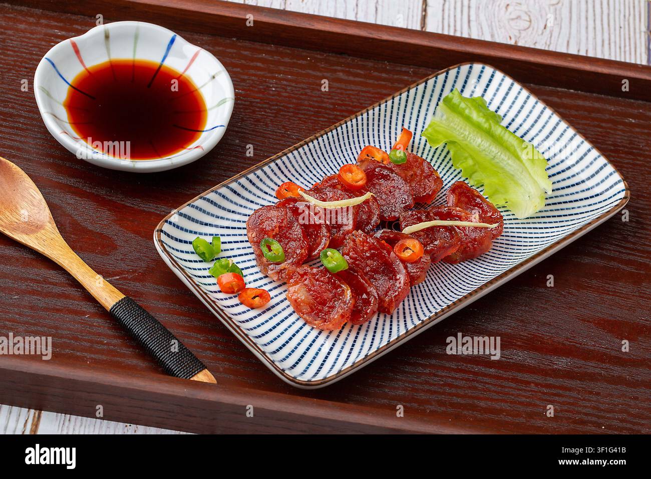 Salsiccia cinese al vapore con olio di camelia premium Sapori cantonesi tradizionali Foto Stock