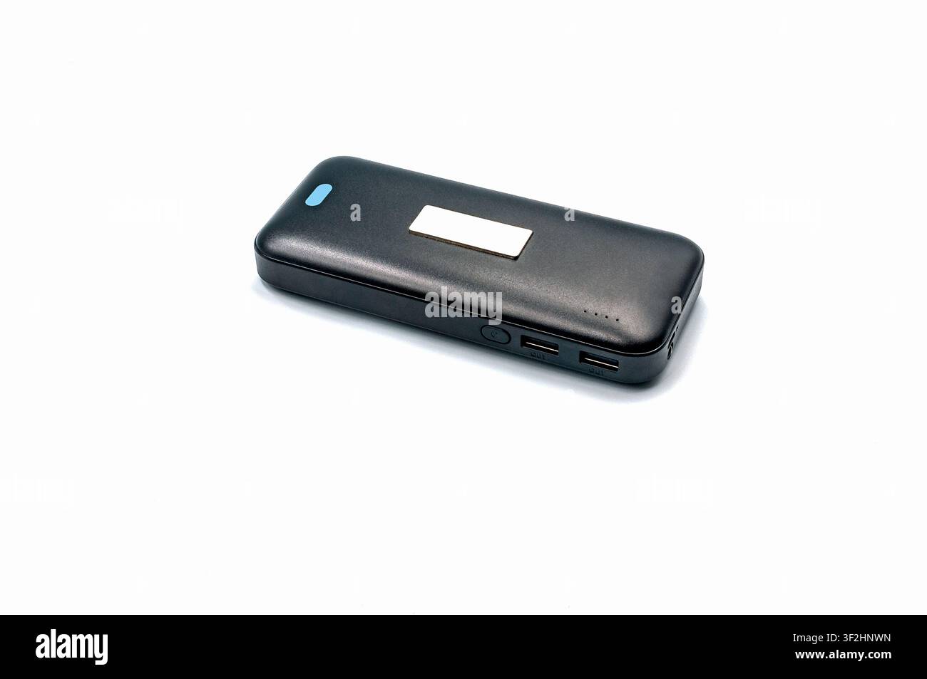 Caricatore portatile a batteria nero isolato su sfondo bianco Foto Stock