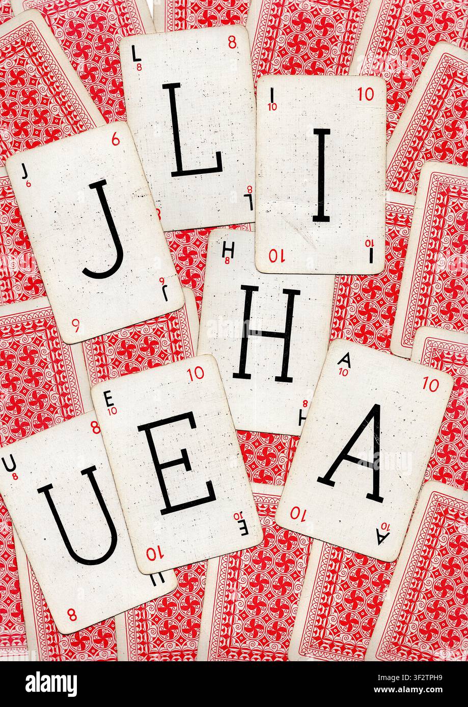 Un montaggio di carte da gioco vintage con alfabeto. Foto Stock