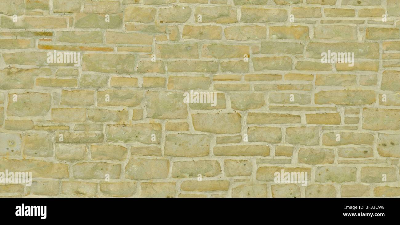 Una vista dettagliata di un muro in calcare beige chiaro con motivo a blocchi orizzontali e malta chiara. Foto Stock