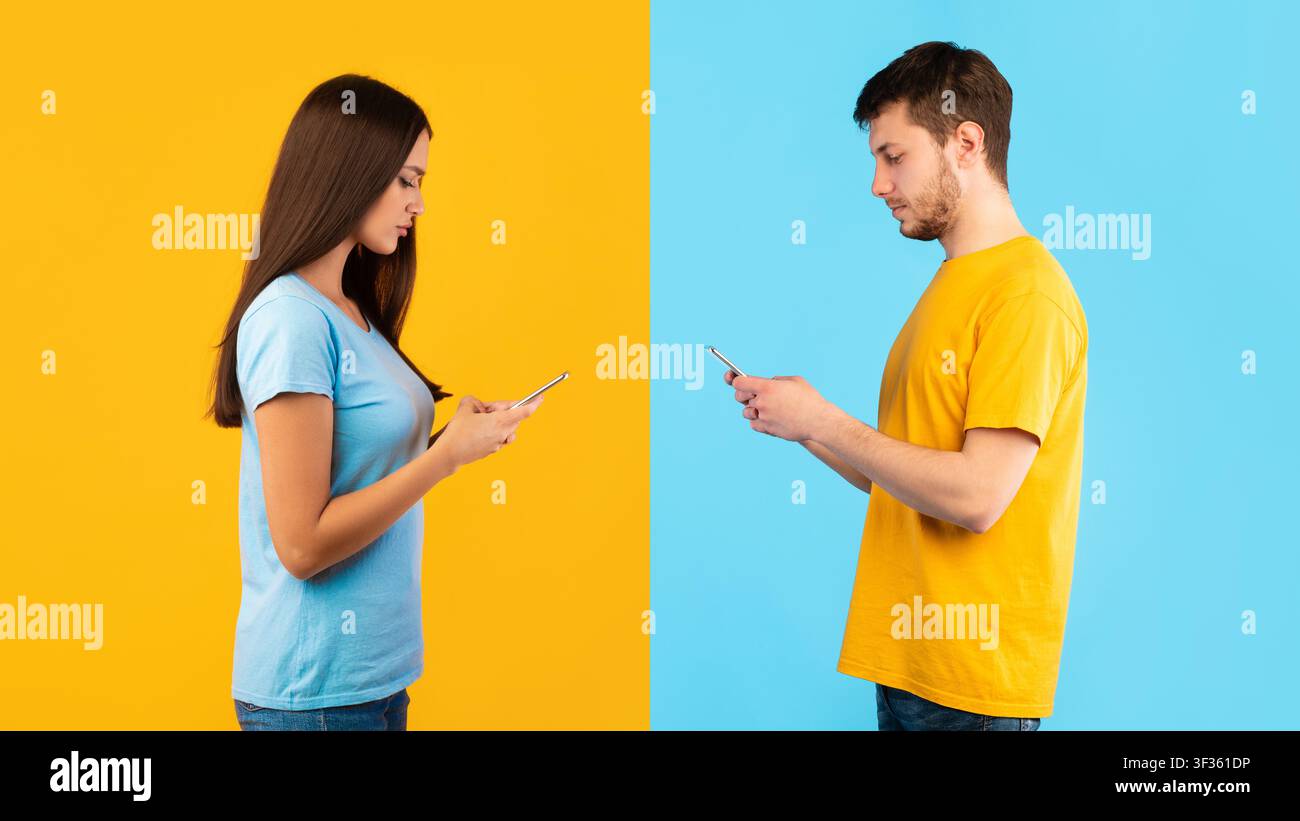 Ritratto di giovani coppie che usano i loro telefoni cellulari Foto Stock