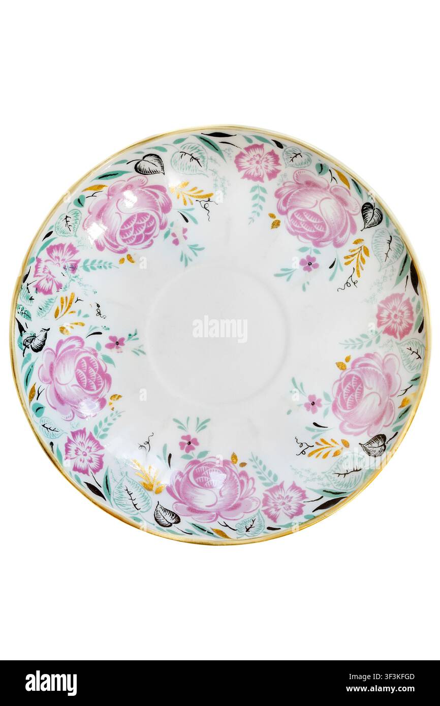 Saucer in porcellana dorata dipinta isolato su sfondo bianco Foto Stock