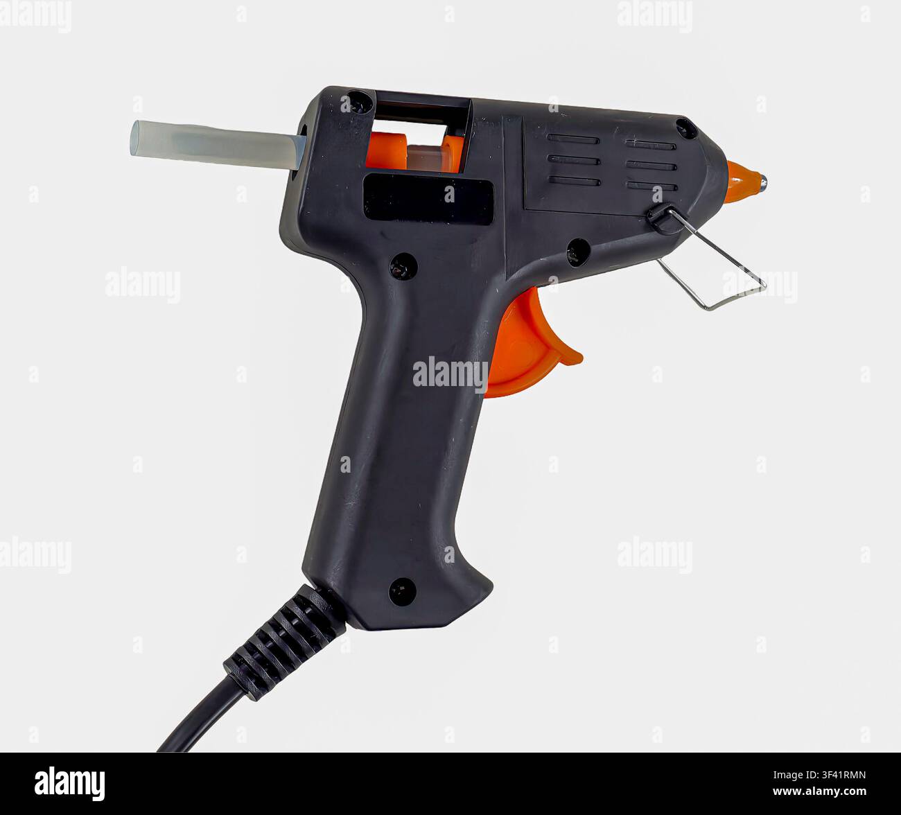 Questa pistola per colla è progettata per un incollaggio rapido e un'applicazione precisa. È dotata di una presa ergonomica, rendendola adatta a vari lavori di hobbistica e riparazione Foto Stock