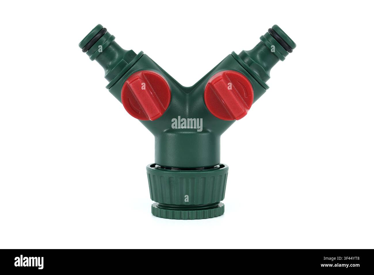 Y-splitter verde con valvole rosse per collegamento tubo da giardino Foto Stock