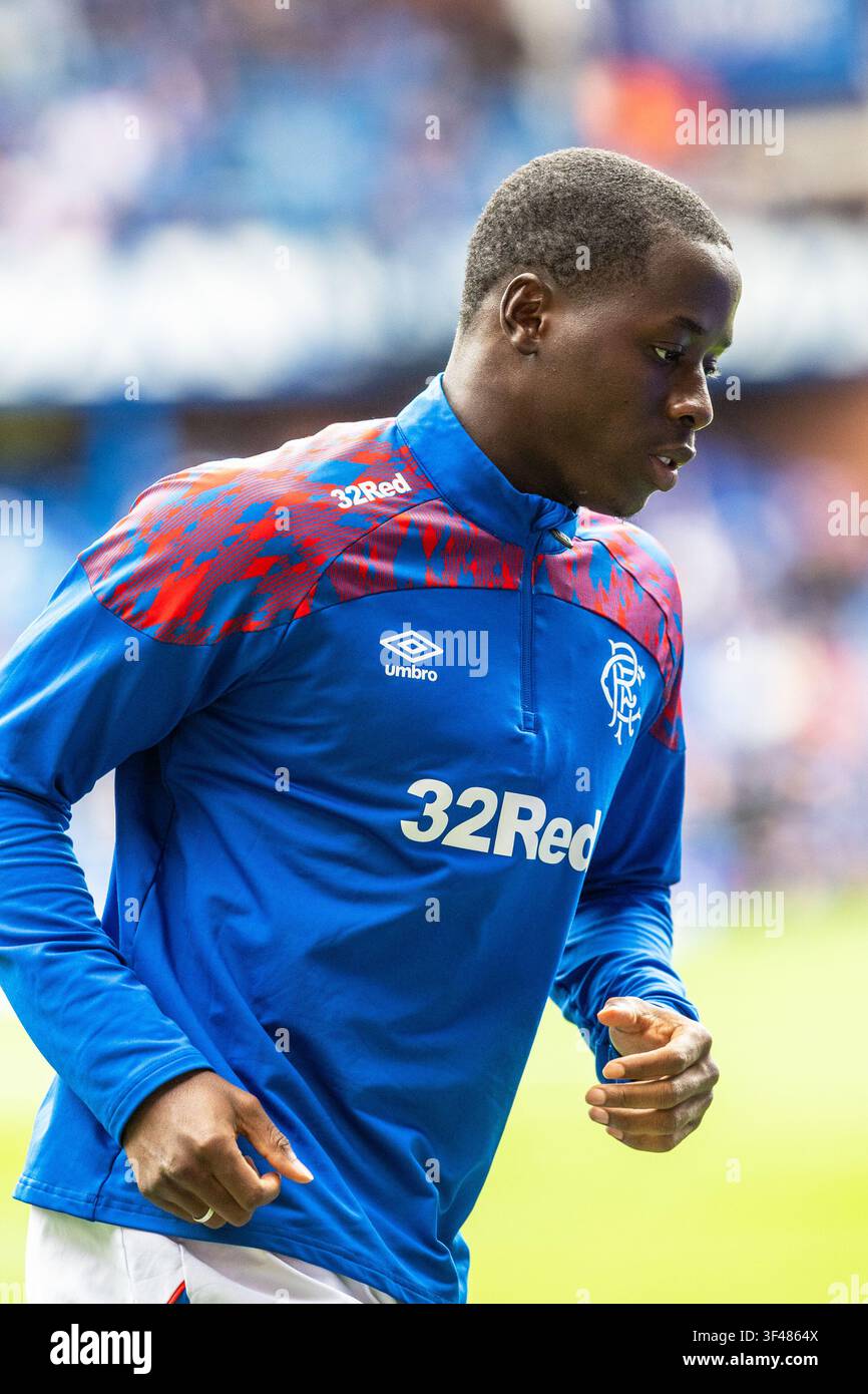 Djeidi Gassama, calciatore professionista, attualmente in forza al Rangers FC, con sede a Glasgow, Scozia, Regno Unito. Immagine scattata durante l'allenamento pre-partita Foto Stock