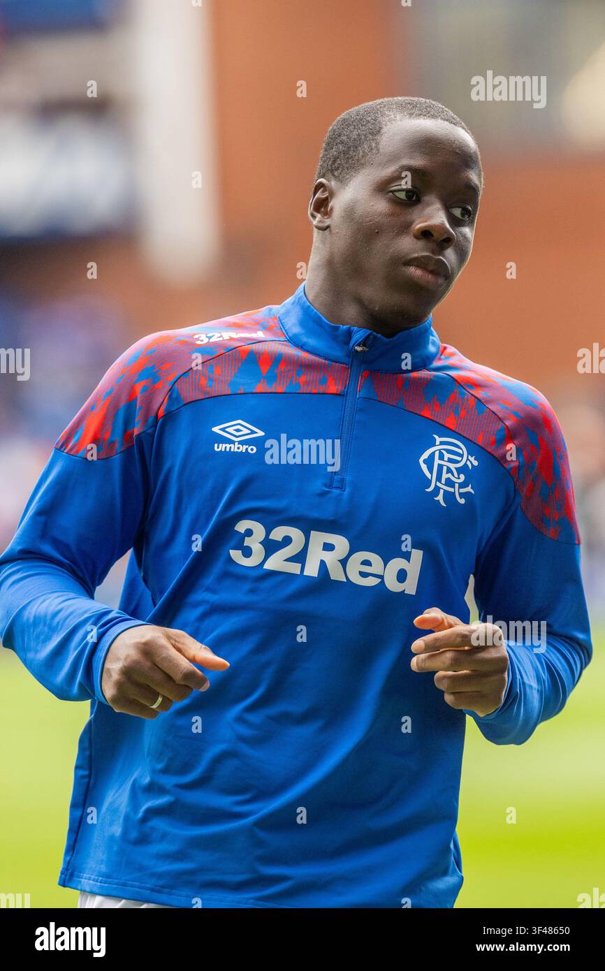 Djeidi Gassama, calciatore professionista, attualmente in forza al Rangers FC, con sede a Glasgow, Scozia, Regno Unito. Immagine scattata durante l'allenamento pre-partita Foto Stock