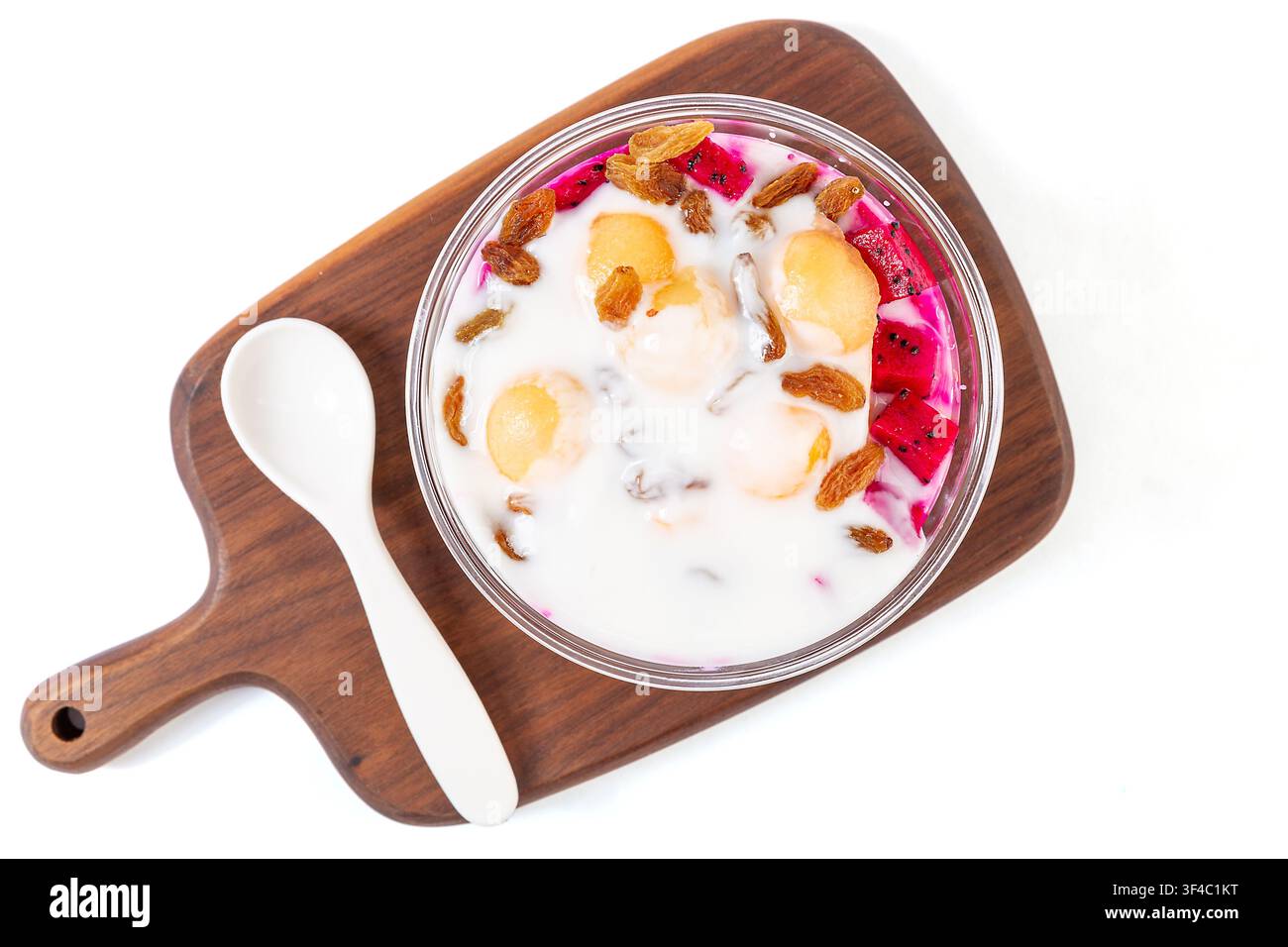Ciotola di dessert alla frutta con yogurt alla pesca e frutto del drago Foto Stock