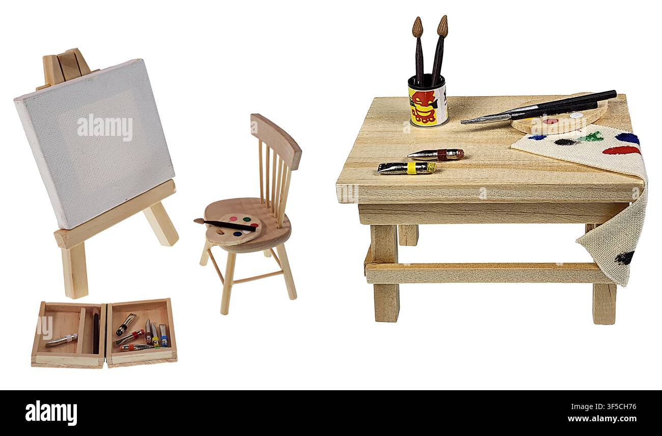 Pennelli e materiale per la pittura e sedia con cavalletto pronti per la prossima creazione Foto Stock