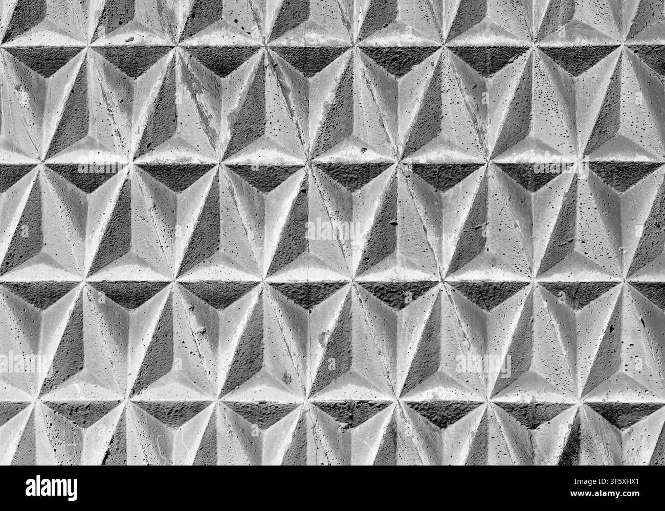 Texture grigia di piastrelle decorative geometriche triangolari Foto Stock