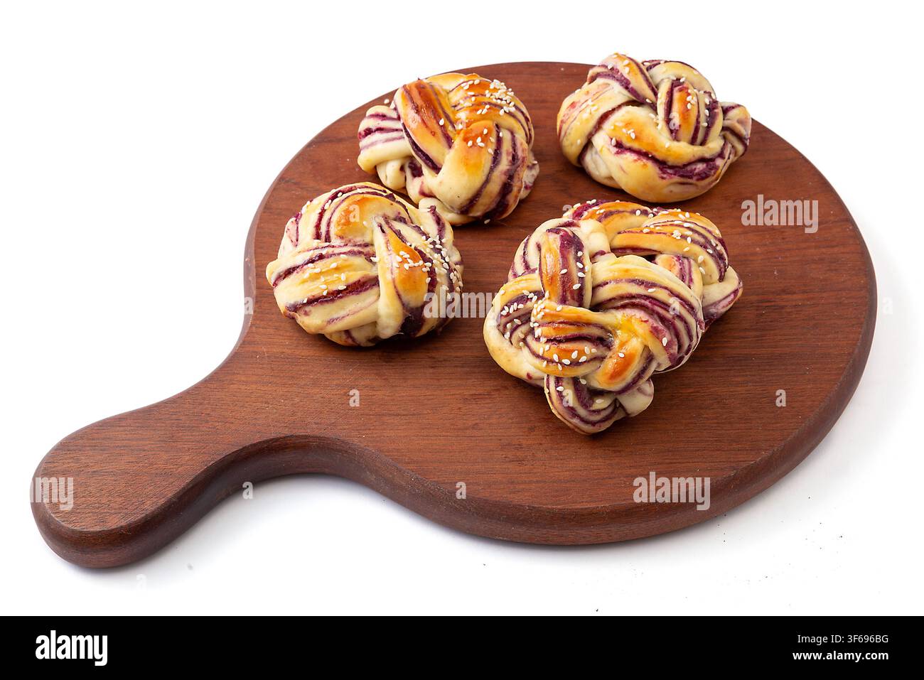 Mini pagnotte di toast alle patate dolci viola con crosta a vortice Foto Stock