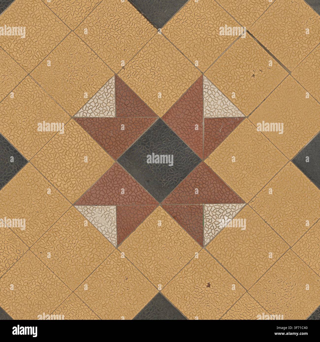 Vista dall'alto di piastrelle vintage con motivo geometrico in ocra, rosso terracotta e motivo scuro. Foto Stock