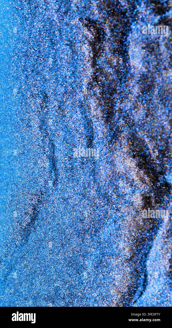 Mescolando inchiostro alcolico nella fotografia macro per mostrare colori e texture vivaci Foto Stock
